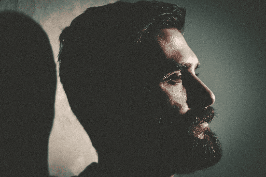 Man by Vinicius amnx Amano on Unsplash